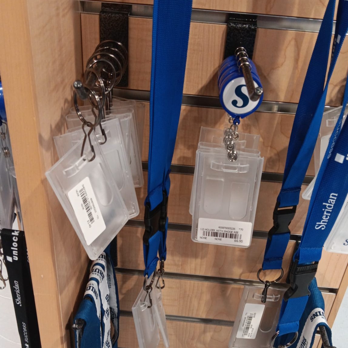 Sheridan Keychains (ID Holders):
The plastic keychains clicked lightly against each other when moved. The attached rings created small metallic tapping sounds.