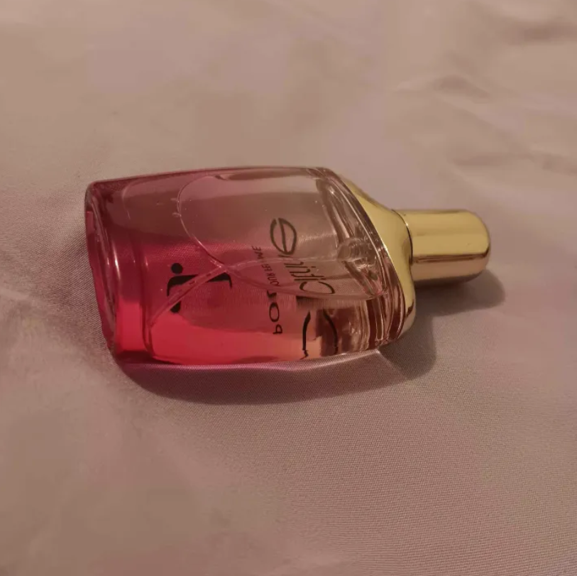 A special perfume I got from Japan, a redish purple with a gold rim.